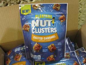 lot 145 image: Case of 8 Planters Nut Clusters Sal...