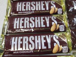 lot 157 image: 12 Hersheys Milk Chocolate with Alm...