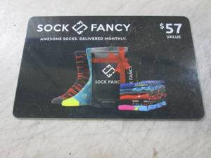 lot 230 image: Sock Fancy $57 Discount Card  CNTR...