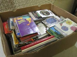 lot 245 image: Box Full of DVDs and Books  A-4...