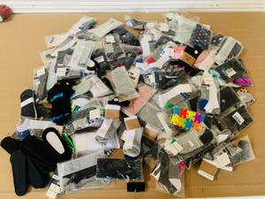 lot 12 image: Huge lot of socks 100 pairs