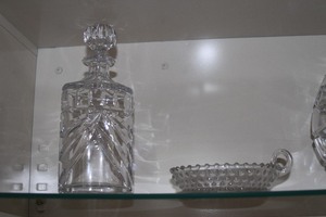 lot 43 image: Cabinet Full of Cut Glass  Crystal Vase Decanter Bowl & More