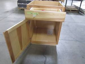 lot 201 image: Hampton Assembled 24x34.5x24 in. Base Kitchen Cabinet with Ball-Bearing Drawer Glides in Natural Hickory KB24-NHK