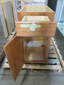 lot 305 image: Hampton Assembled 15x34.5x24 in. Base Kitchen Cabinet with Ball-Bearing Drawer Glides in Medium Oak KB15-MO