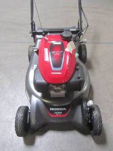 lot 1-703 image: Honda 21 in. 3-in-1 Variable Speed Gas Walk Behind Self Propelled Lawn Mower HRN216VKA