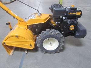 lot 1-706 image: Cub Cadet 18 in. 208cc Rear-Tine Dual-Direction Gas Tiller RT 65
