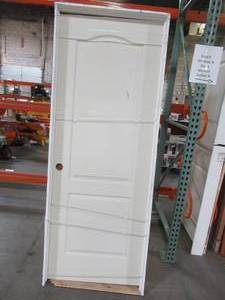 lot 611 image: Masonite 30 in. x 80 in. Solidoor 2-Panel Arch Top Solid-Core Textured Primed Composite Single Prehung Interior Door. - Some Scratches, LooseCracked Jamb.