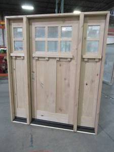 lot 613 image: Krosswood Doors Approximately 68 12 X 82 14 X 5 12 Jamb Wall. Unfinished, RH Inswing, Double Bore With 14 Lite and Matching Side Panels.