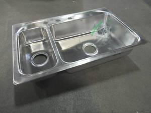 lot 838 image: Moen 2000 Series Drop-in Stainless Steel 33 in. 4-Hole Double Bowl Kitchen Sink, G202854 - USED