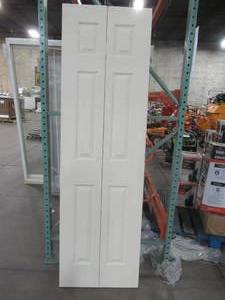 lot 619 image: 24 in. x 80 in. Colonial Primed Textured Molded Composite MDF Closet Bi-fold Door - Hollow Core.