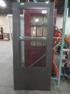 lot 622 image: LARSON Brown Mid-View Storm Door Measures Approximately 35 34 x 79 34 - Hardware not included.