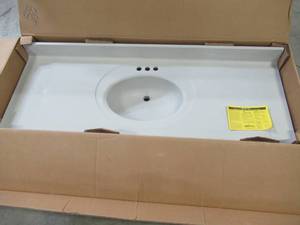 lot 335 image: US MARBLE Custom Vanity Top. Single Center Basin, Pre-Drilled, Back splash, Approximate Measurement 61 14 X 22