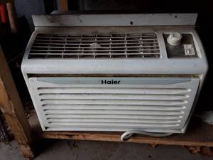 lot 32 image: Haier Window Unit AC 110120 Volt 5,000 BTUs.