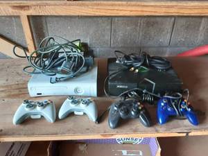 lot 16 image: X-Box, X-Box 360 Both Have Power & AV Cords & 2 Remotes Each