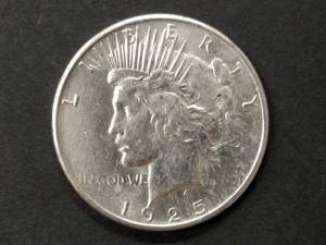 1925 High Grade Peace Silver Dollar...