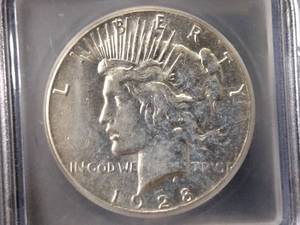 1928 ICG AU50 Peace Silver Dollar...