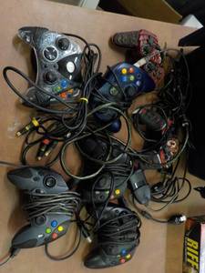 Lot of Gaming Controls and Riff Mus...
