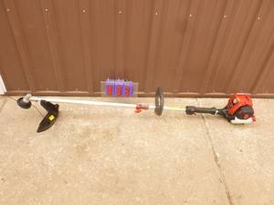 Craftsman 4 cycle trimmer. Like new. Tested & works. As shown.