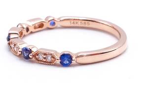 lot 31 image: Beautiful Sapphire and Diamond Estate Band in 14k Rose Gold - $2275