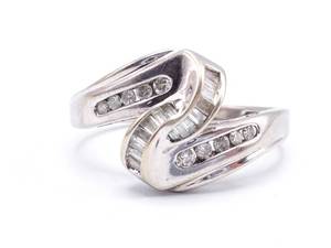lot 32 image: Ribbon Styled Diamond Estate Ring in 14k White Gold - $3299