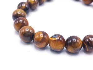 lot 54 image: Adjustable Tigers Eye Bead Bracelet