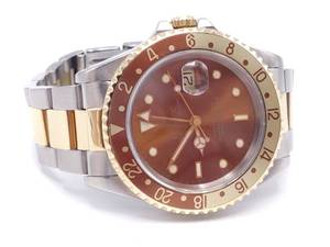 lot 1 image: Mens Rolex (Rootbeer) GMT Master II Model 16713 40mm 18k Gold and SS VIDEO