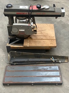 lot 10 image: Delta Radial Arm Saw With Tool Stand