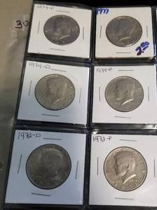PAGE OF KENNEDY HALF DOLLARS SOME SILVER INCLUDED