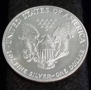 1987 AMERICAN SILVER EAGLE 1 TROY OZ. .999 FINE SILVER DOLLAR