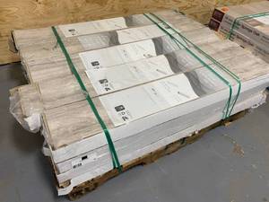 lot 37 image: LAKESHORE Flooring MODEL 50560 LOT OF 19 CASES Lakeshore Pecan Stone 7mm Thick x 7-23 in. Wide x 50-58 in. Length Laminate Flooring (24.17 sq. ft.  case)