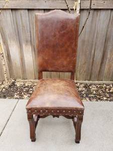 lot 33 image: Distressed Leather Carved Chair