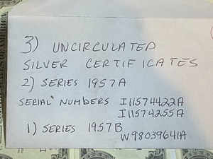 lot 36 image: (3) uncirculated silver certificate...