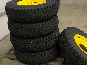 lot 7 image: Sno-Wolf Skid-Loader Snow Tires