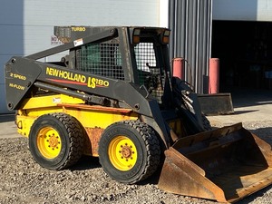 lot 3 image: New Holland LS-180 Skid-Loader