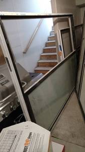 8 foot tall by 6 ft wide patio door Black exterior with white interior