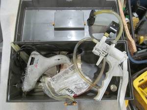 lot 167 image: Plano case, ace glue gun