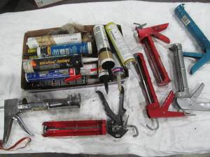 lot 303 image: caulking guns , chalk