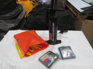 lot 383 image: rain ponchos, Coleman pump, tent stakes