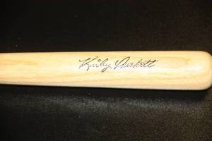 lot 107 image: Kirby Puckett Wood Louisville Slugger Mini Bat