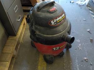 lot 14 image: 5.0 ShopVac- powers on needs attac...