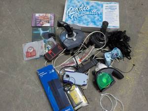 lot 25 image: Radio Transmitter, DVDs, Game Cont...
