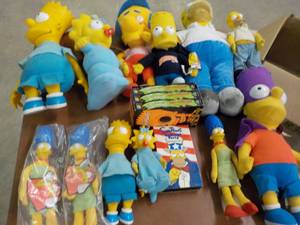 lot 64 image: Simpson Collectibles and VHS tapes...
