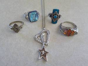 lot 121 image: 4 Rings, and 1 Necklace- all marked...