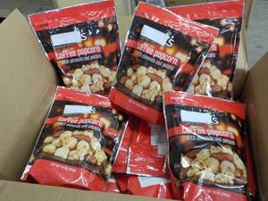 lot 181 image: Case of Toffee Popcorn, cherry Cola...