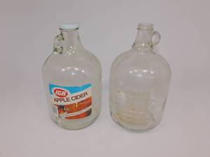 lot 48 image: Two Vintage Apple Cider Containers