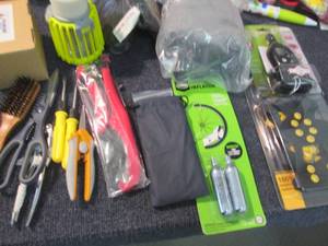 lot 2 image: Traction Cleats, CO2 Inflator, Bug ...