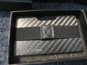 lot 20 image: 6 Black Titan Money Clips...