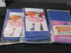 lot 55 image: 2 Toy Storage Bags, 1 Puzzle Saver...