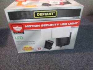 lot 181 image: Defiant 180-Degree Black Solar Powe...