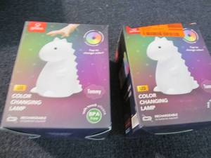 lot 191 image: 2 Globe Silicone Tommy Dinosaur Whi...